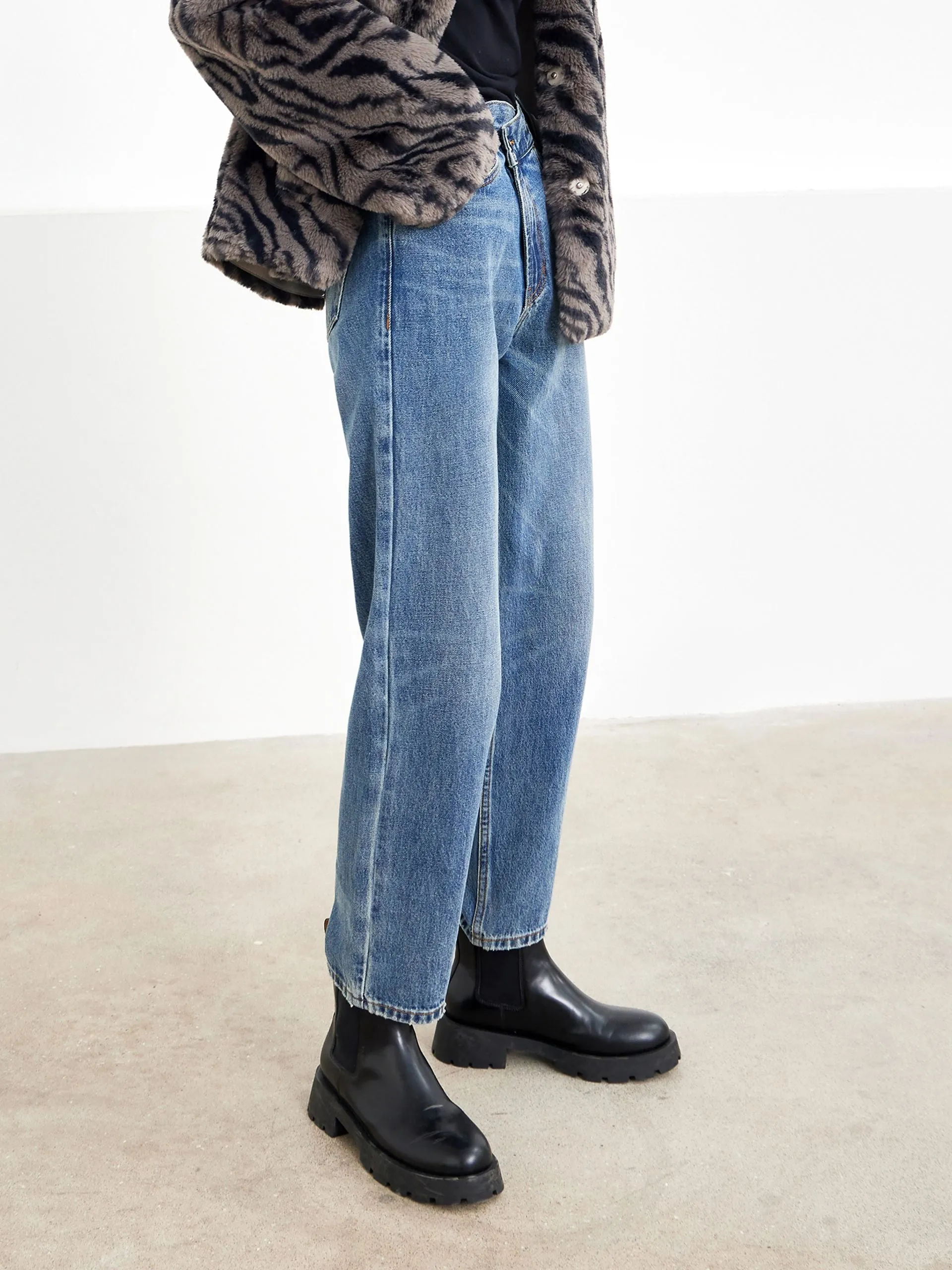 Asymmetric Waistband Faded Tapered Jeans