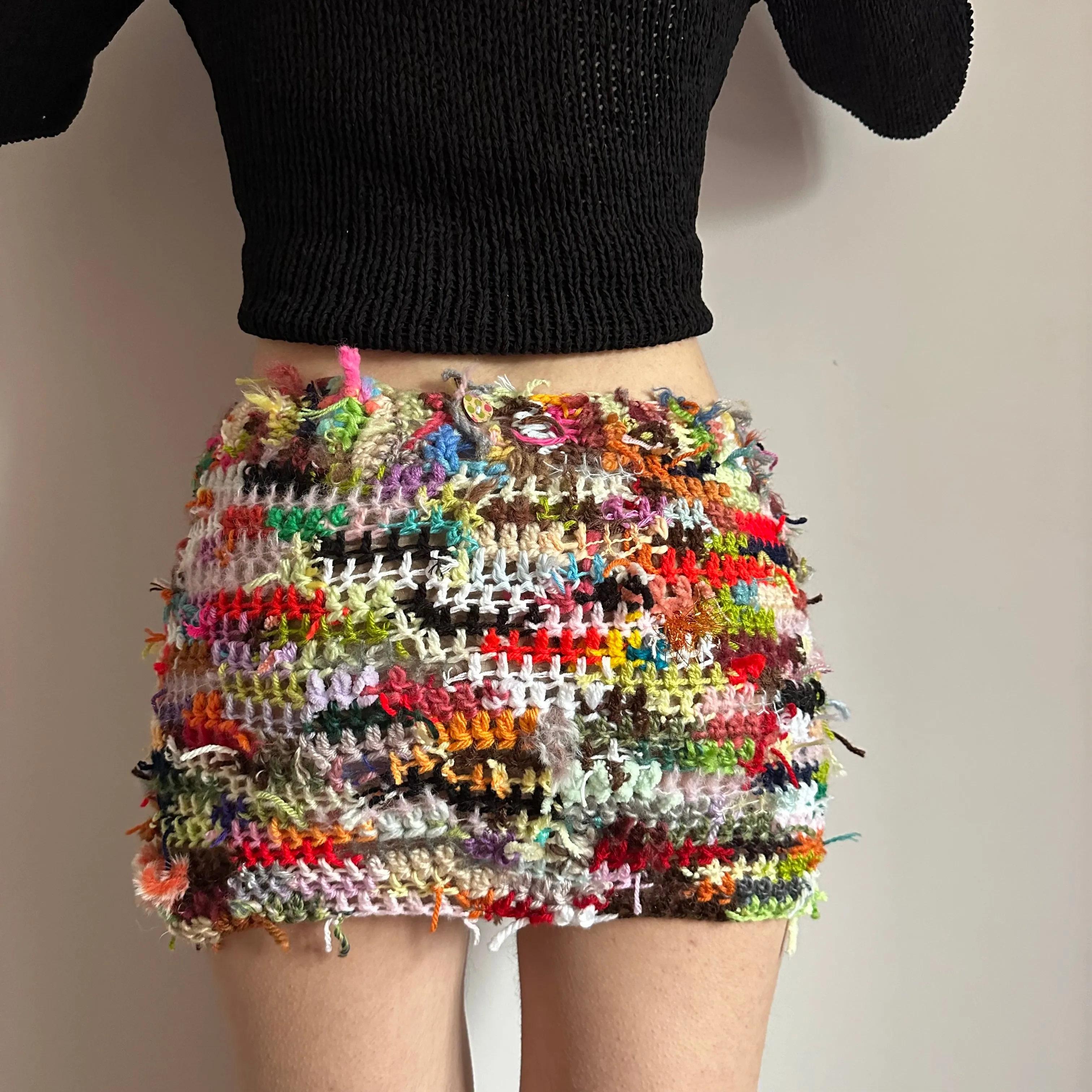 Handmade scrappy crochet mini skirt - 1 of 1, made of leftover yarn scraps