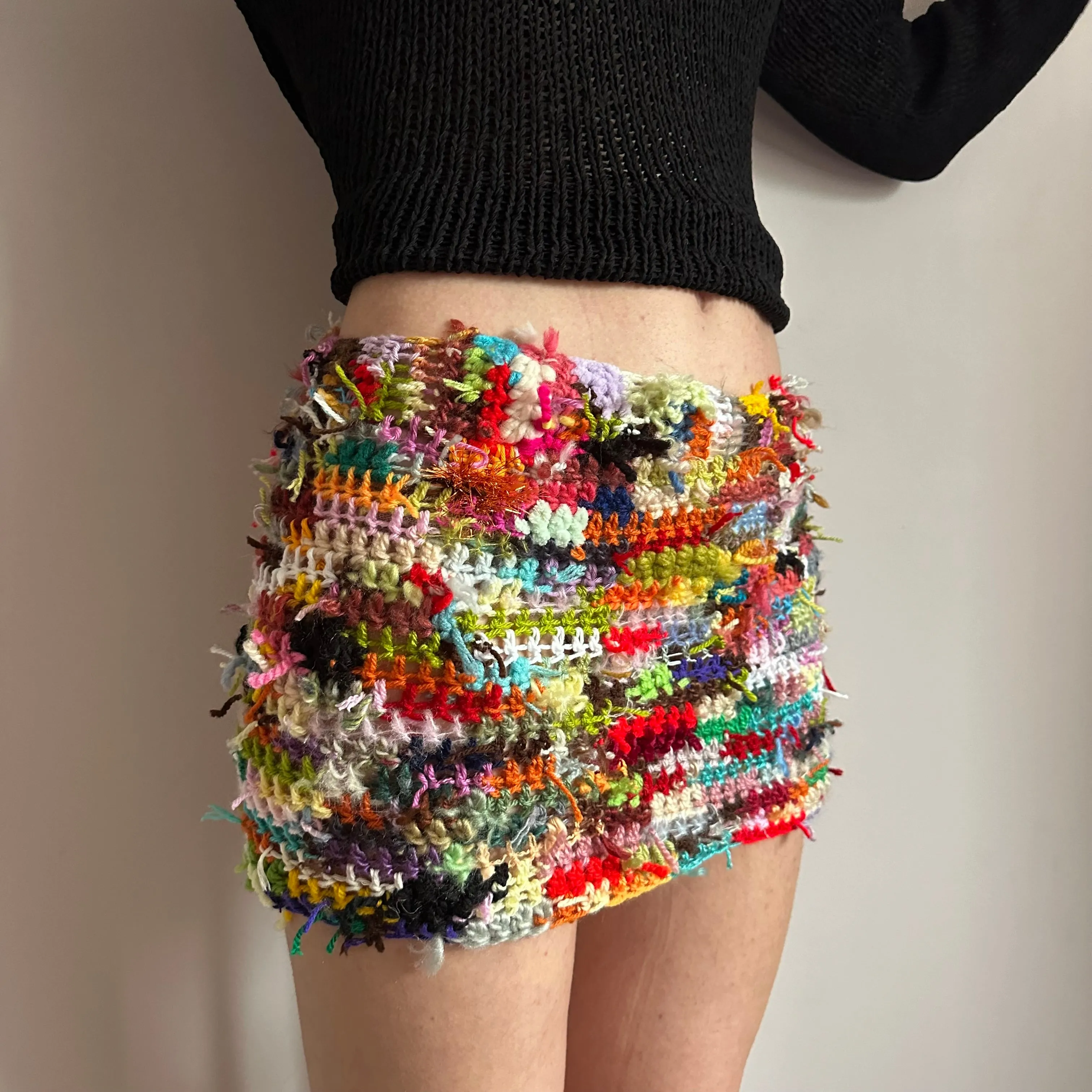 Handmade scrappy crochet mini skirt - 1 of 1, made of leftover yarn scraps