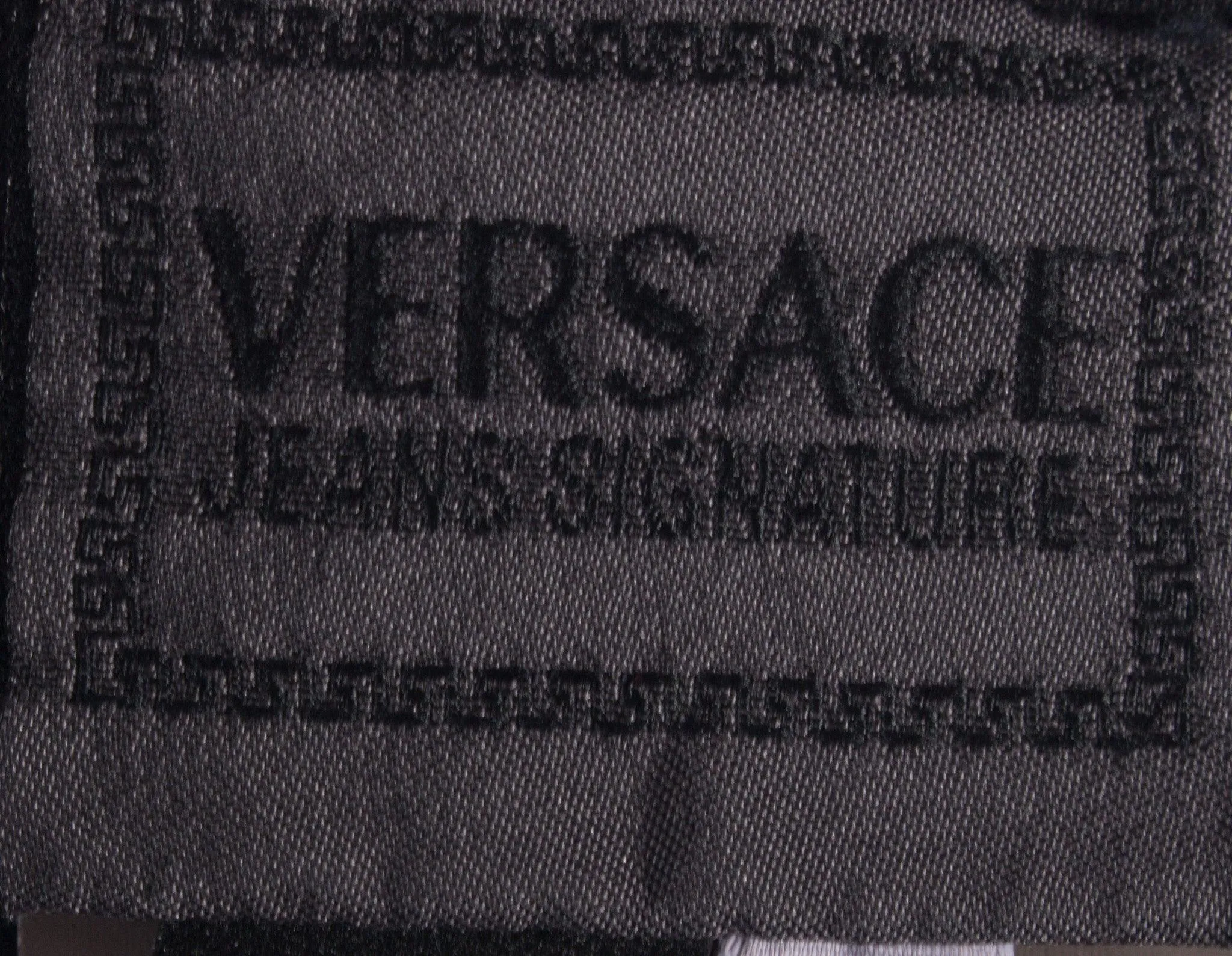 Versace Signature Jeans Black with Bronze and Silver Zips. 24 inch waist